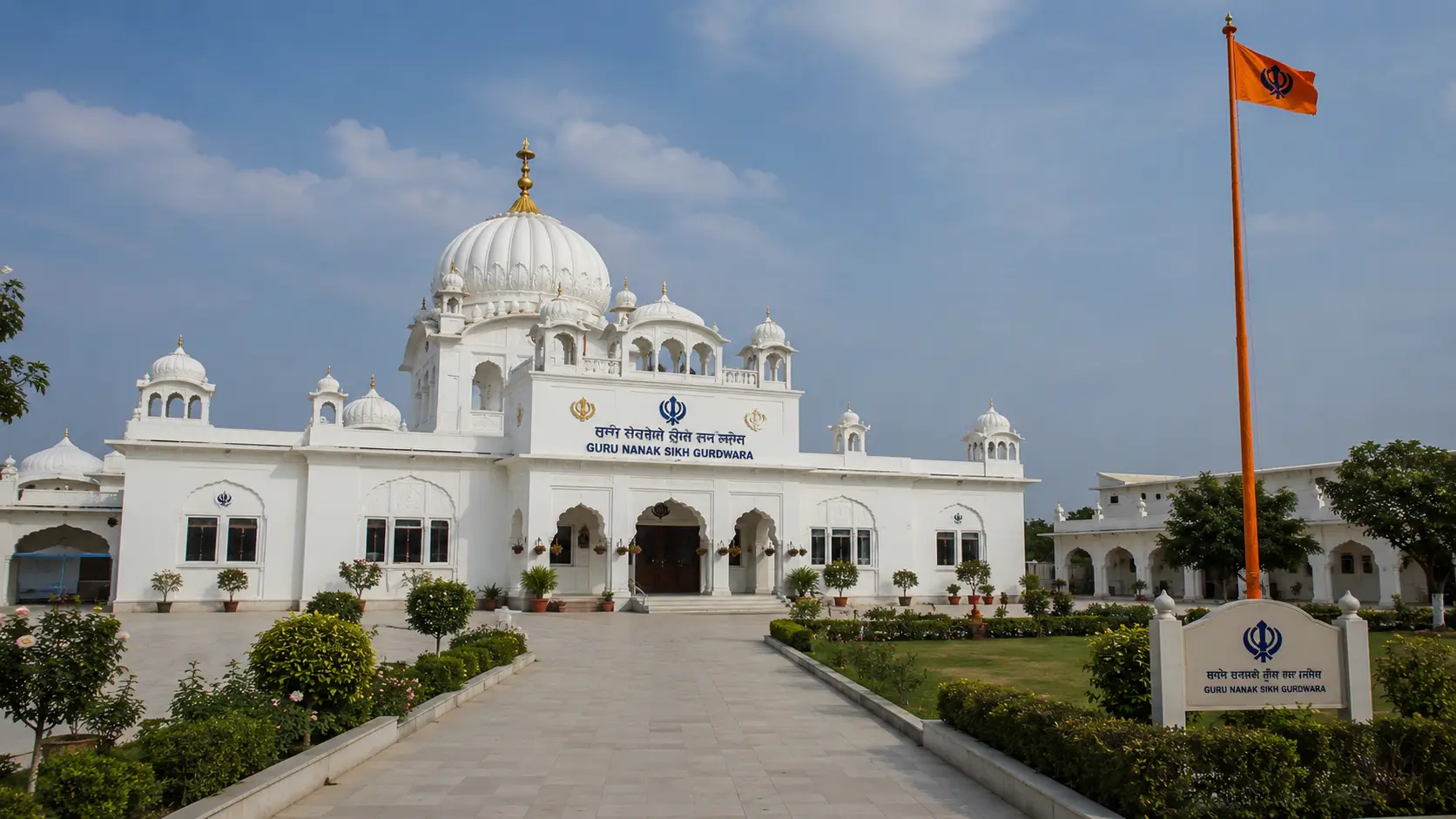 A respectful exterior shot of a Sikh gurdwara.